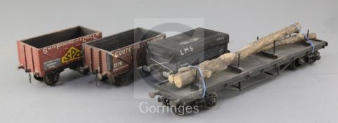 A G.W. flat bolster bogie truck with timber load, no.849, in grey, an LMS covered wagon 12T, no.