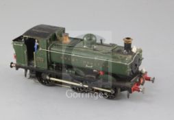 A scratch built 0-6-0 Pannier locomotive, number 5758, GW green livery, with switch for reversing