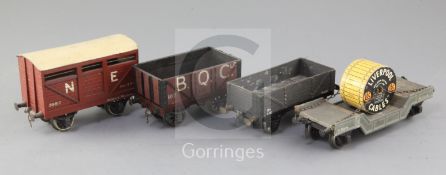 A flat wagon, no.M2016, an LMS 6 plank 12T open wagon, no.71403, an open wagon 'BQC', no.103 and