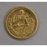 An Iranian Half Pahlavi gold coin, Mohammad Reza Shah 4.06g, GVF