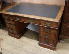 A Victorian walnut pedestal desk W.136cm