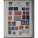 A Cardinal All World stamp album including commonwealth issues and an album of F.D.C's and loose