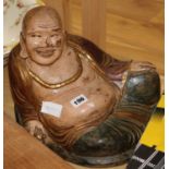 A Chinese painted wood figure of Budha and a scroll H.30cm.