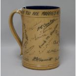 A Doulton Lambeth presentation mug, incised with signatures of the factory workers on the marriage