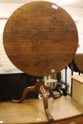 A George III oak tripod table W.75cm