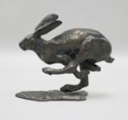 A bronze model of a running hare 12.5cm