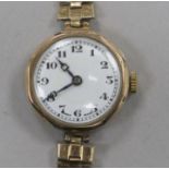A lady's 9ct gold Rolex manual wind wrist watch, with engraved monogram, on later associated 9ct
