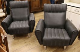 A pair of 1970's Industrial Armchairs