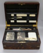 A writing box containing inkwells Length 38cm.