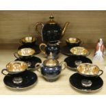 An Italian retro black and gold coffee service, setting for six, with 'Fiorentine Italy' painted