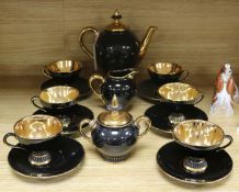 An Italian retro black and gold coffee service, setting for six, with 'Fiorentine Italy' painted