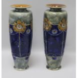 A pair of large Royal Doulton stoneware vases c.1910 H.36cm.
