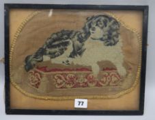 A Victorian needlepoint of a Spaniel W.32cm. H.23cm.