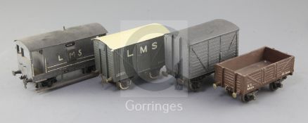 An SR open wagon, 10T, no.6905, in brown, an LMS box van, no.32573, in grey, a box van in grey and