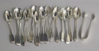 Seventeen assorted silver teaspoons, including a set of six and a pair of silver of silver sugar