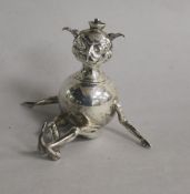 A George V novelty silver cigar lighter, modelled as a 'Lincoln Imp?', Henry Charles Freeman,