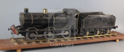 A live steam 2.5 inch 0-6-0 tender locomotive, black livery, overall 75cm