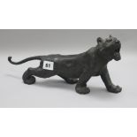 A 19th century Japanese bronze of a roaring tiger Length 35cm.