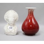 A Chinese blanc de chine bust and a sang-de-boeuf glazed vase 20cm