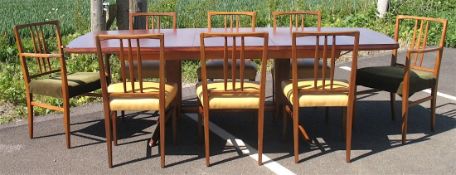 A Gordon Russell 'Burford' Extending Dining Table and Eight Matching Chairs, with the original