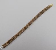 A 9ct gold rustic link bracelet, 18cm.