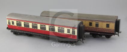 A pair of BR 1st class coaches, no's.9272 and no.26233 (Bassett Lowke), in blood and custard