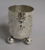 A 19th? century embossed silver beaker, with hallmarks for London Assay Office, London, 1999,