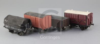 An open wagon, in brown, a box van, no.M232576, in red, a horse box, LMS no.6510, in red and a
