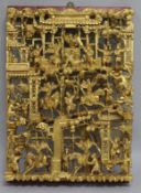 A Chinese gilt painted wood panel H.41cm. W.30cm.