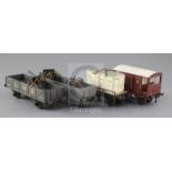 A set of four: NE guards van by Leeds Model Co, No 71911, BR flat wagon with load, No 41713, LMS 5