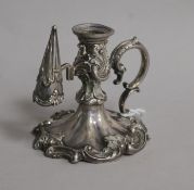 An ornate eatly Victorian silver chamberstick and snuffer by Henry Wilkinson & Co, Sheffield,