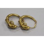 A pair of Polish 14ct gold 'rams head' hoop earrings.