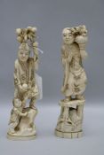 Two Japenese walrus ivory okimono 20cm