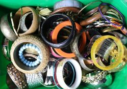 A box of mixed costume jewellery.