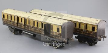 Two Bowman GWR carriages, metal with opening doors, each no.10152, in chocolate and cream