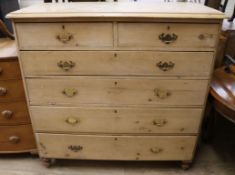 A large pine chest of drawers W.122cm.