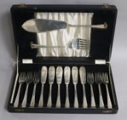 A cased set of six pairs of silver fish eaters and pair of matching servers, Elkington & Co,