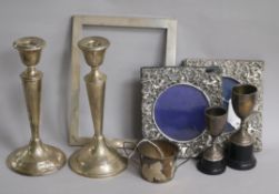 A pair of silver tapered candlesticks (weighted) and sundry items, including a pair of silver-