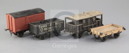 An Evans and Bevan open wagon with load, no.4107, in black, a Portland Stone, no.89, a guards van