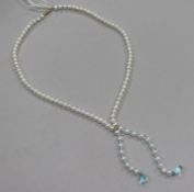A single strand freshwater pearl and blue topaz tassel drop necklace, with 9ct gold clasp, approx.