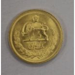 An Iranian One Pahlavi gold coin, Mohammad Reza Shah, 8.1g, AEF
