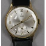 A gentleman's 1960 9ct gold Tudor manual wind wrist watch, on leather strap with Rolex buckle,
