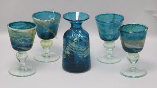 A set of four Medina 'sea and sand' decorated glass goblets and a similar carafe all signed to base,