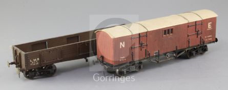 A NE bogie van, 25T "Special Goods", no.102497, in red and an LMS open mineral wagon, double bogies,