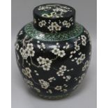 A Chinese famille noire jar 22cm