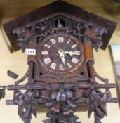 A Black Forest cuckoo clock H.53cm. W.43cm.