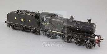 A scratch built O gauge 4-4-0 tender locomotive, compound number 567, LMS black livery, 3 rail,