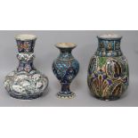 Three Palestinian pottery vases H.21cm.