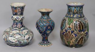 Three Palestinian pottery vases H.21cm.