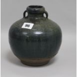 A Chinese Henan type black and green glazed jar, Song-Yuan dynasty H.18cm.